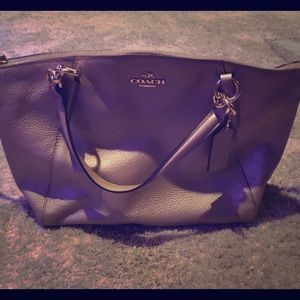 Coach Kelsey Satchel in pebbled gold leather.